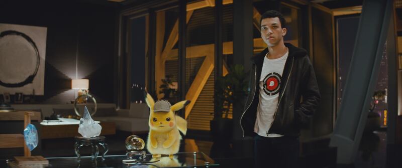 Detective Pikachu (Ryan Reynolds) and Justice Smith as Tim Goodman in "Pokemon Detective Pikachu."