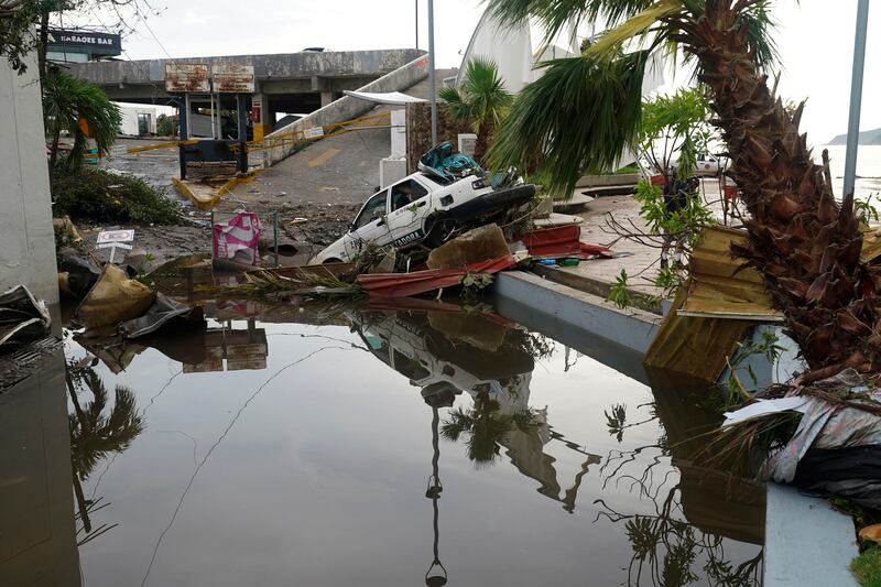 A street is strewn with debris after Hurricane Otis ripped through Acapulco, Mexico.