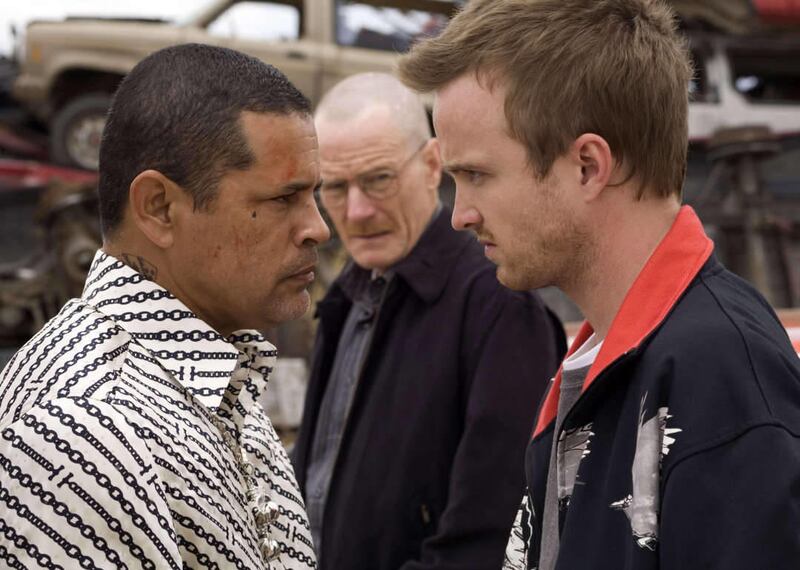 Jesse Pinkman, played by Aaron Paul, right, faces off with powerful drug lord Tuco, played by Raymond Cruz, left, as Walt White, played by Bryan Cranston, looks on in a scene from the AMC original series, "Breaking Bad."