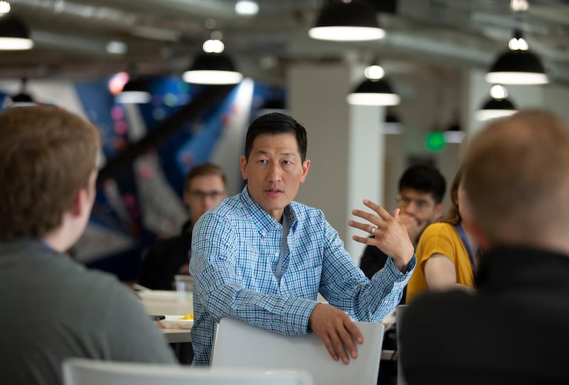Lucid co-founder and CEO Karl Sun speaks to new employees at the company’s offices in South Jordan on Friday, May 24, 2019.