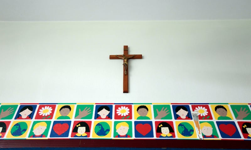A crucifix hangs on the wall of a classroom at St. Anthony’s School in Indianapolis.