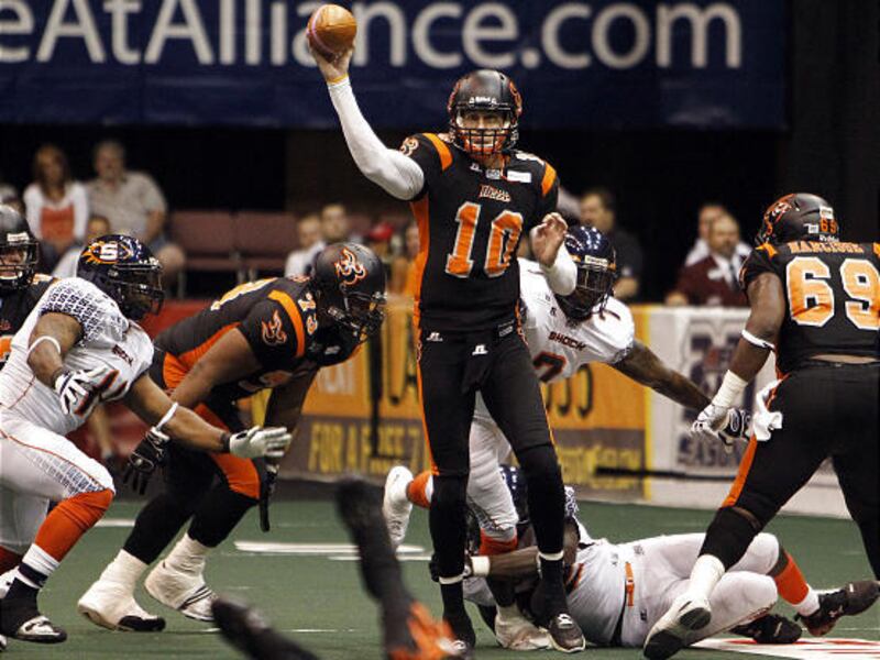 Blaze quarterback Tommy Grady passes the ball as the Utah Blaze face the Spokane Shock in arena football in Salt Lake City, Friday, May 4, 2012.