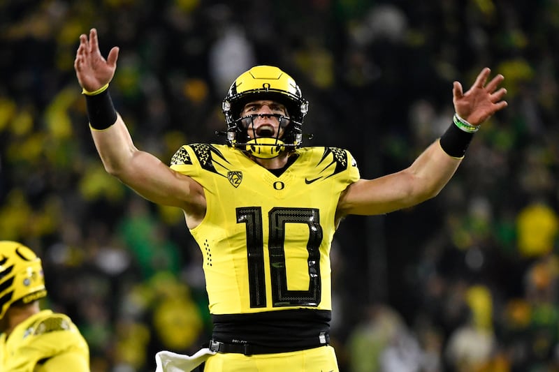 Oregon quarterback Bo Nix celebrates a touchdown against Washington on Nov. 12, 2022, in Eugene, Ore.