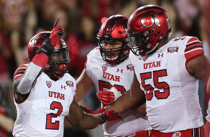 Utah Utes running back Zack Moss (2) celebrates with teammates after scoring a touchdown as Utah and Stanford play a football game in Palo Alto, California, on Saturday, Oct. 6, 2018.