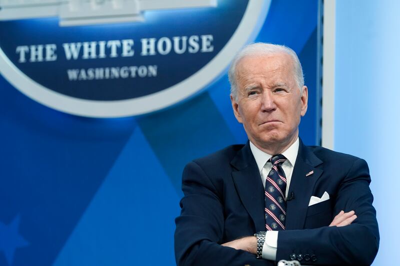 President Joe Biden listens during an event in the Eisenhower Executive Office Building on Feb. 22, 2022, in Washington.