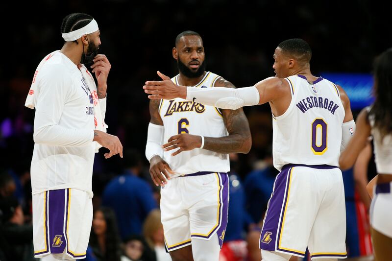 Los Angeles Lakers Anthony Davis, LeBron James and Russell Westbrook during timeout against the Detroit Pistons in LA.