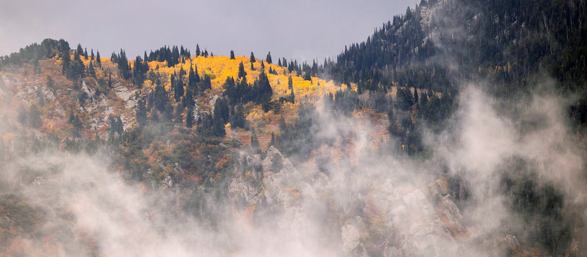 Low clouds move across the Wasatch Mountains.