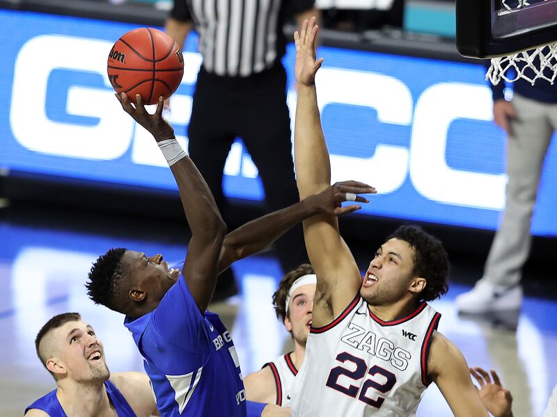Brigham Young Cougars forward Gideon George pushes up a shot over Gonzaga Bulldogs forward Anton Watson.