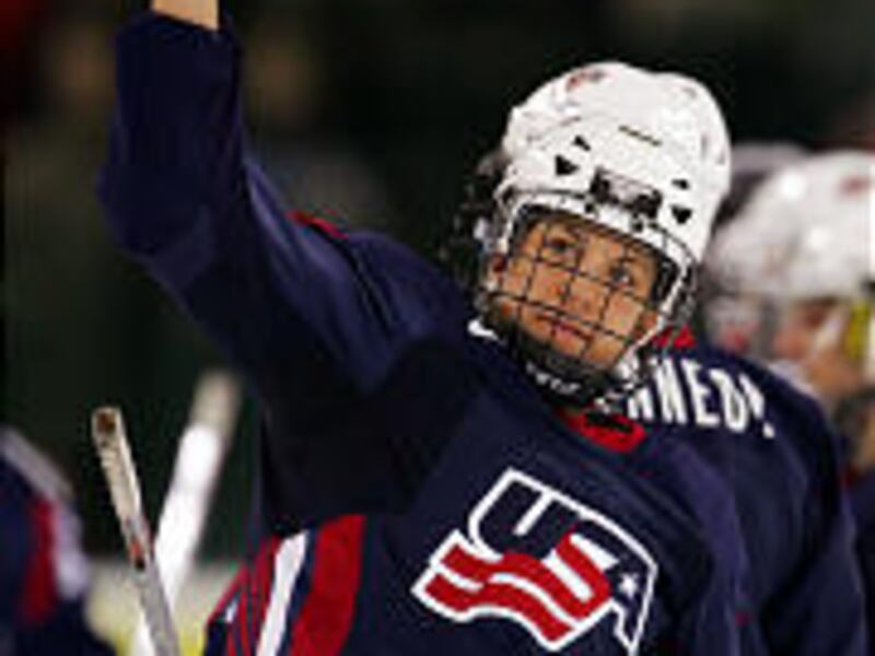 The United States' Jamie Hagerman waves to the crowd after Team USA defeated Finland 4-0 to win the bronze medal in women's ice hockey Monday.