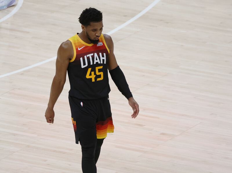 Utah Jazz guard Donovan Mitchell reacts after missing a 3-pointer during Game 6 of the first-round playoff series against Dallas.