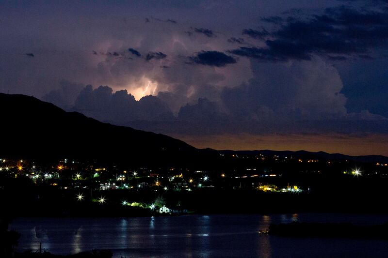 In this Feb. 12, 2016 photo, lightening strikes near the town of Capilla del Monte, Cordoba, Argentina, the site of an alleged UFO sighting 30 years ago.