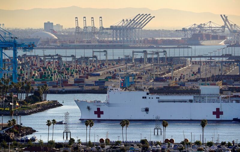 FILE - In this March 27, 2020, file photo, The USNS Mercy enters the Port of Los Angeles in Los Angeles.