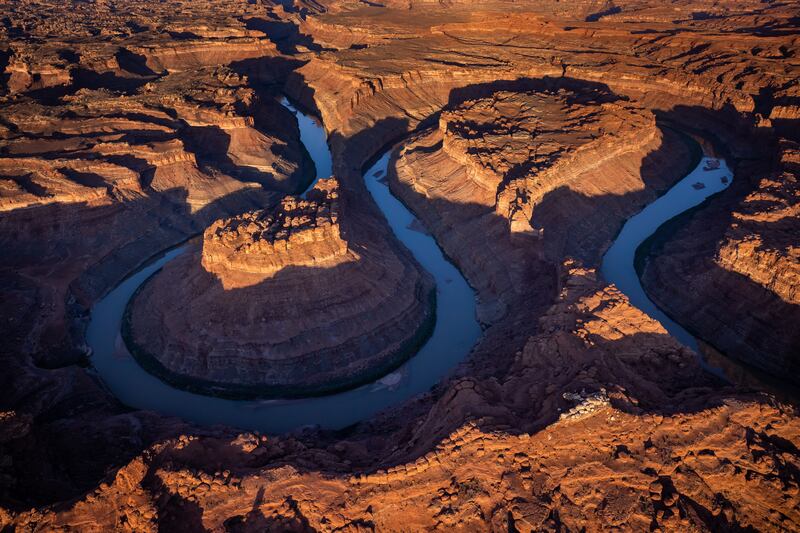 The Colorado River cuts its path through southern Utah near Moab on July 22, 2022.