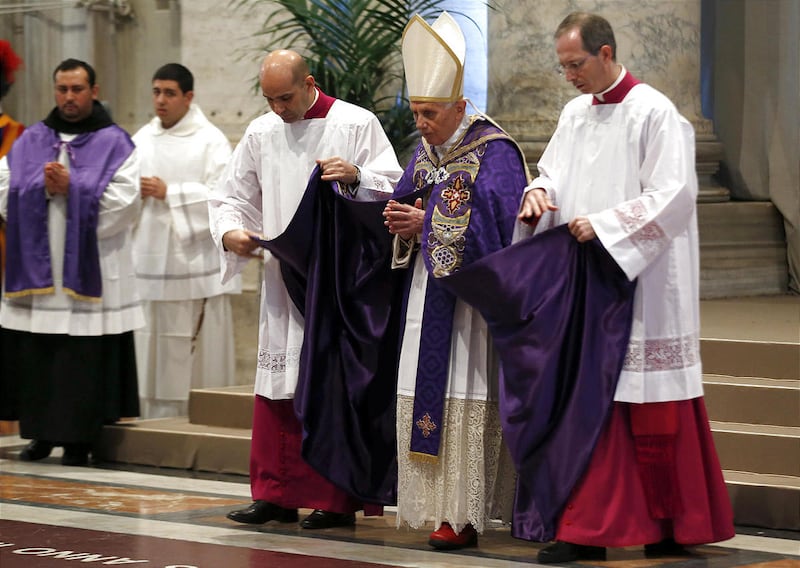 Pope Benedict XVI arrives in St. Peter's Basilica on the occasion of the celebration of Ash Wednesday mass at the Vatican, Wednesday, Feb. 13, 2013. Pope Benedict XVI hit his head during his March 2012 trip to Mexico, The Vatican said Thursday, but denied
