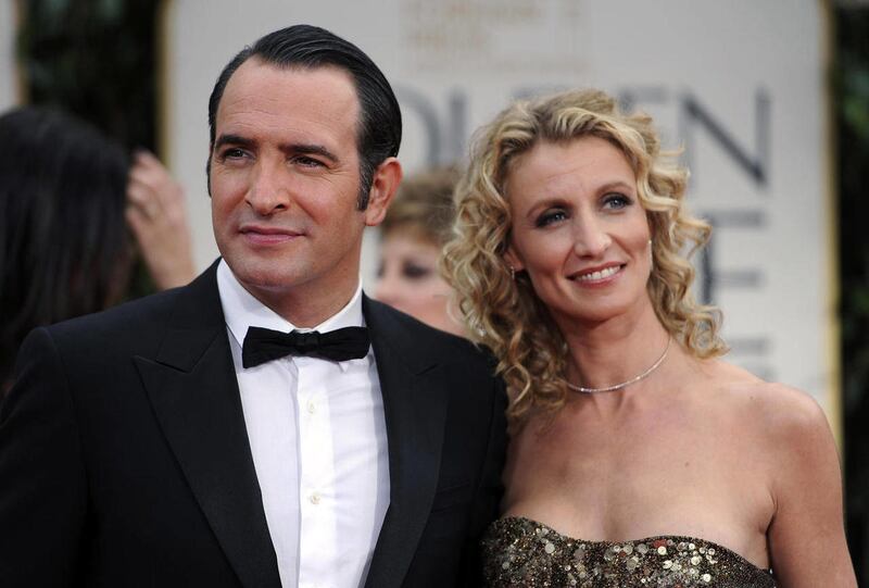 Jean Dujardin and his wife, Alexandra Lamy arrive at the 69th Annual Golden Globe Awards Sunday, Jan. 15, 2012, in Los Angeles.