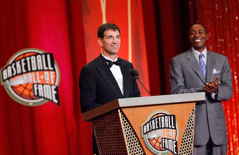 Isiah Thomas presents John Stockton to the Naismith Memorial Basketball Hall of Fame during an induction ceremony on September 11, 2009 in Springfield, Massachusetts.