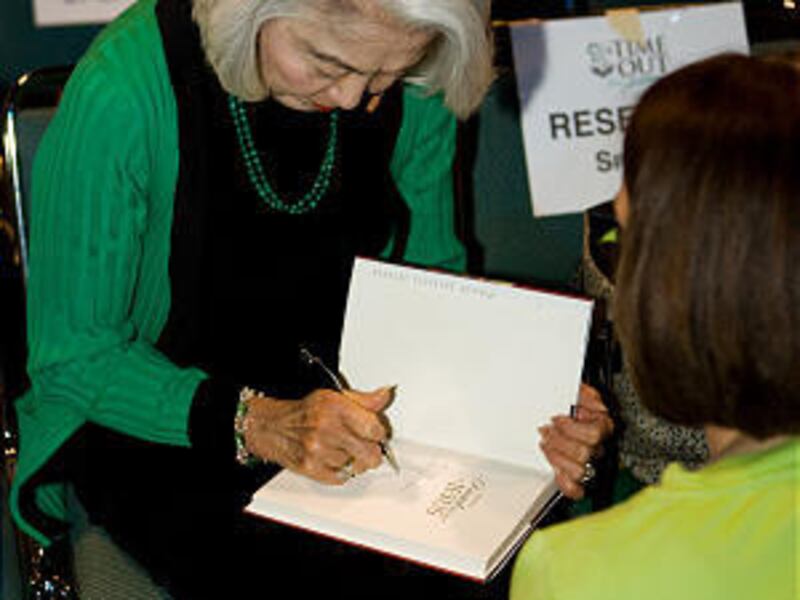 Sister Chieko Okazaki signs her book in Orlando, Fla., in March. She was also a presenter at the event in Logan.