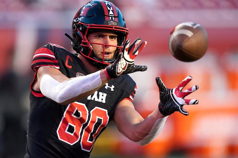 Utah tight end Brant Kuithe catches a pass before the start of their NCAA college football game against San Diego State.