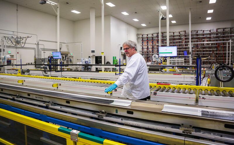 FILE - Karl Moody works on a composite in the linear room at the Orbital ATK manufacturing facility in Clearfield on Thursday, April 20, 2017.