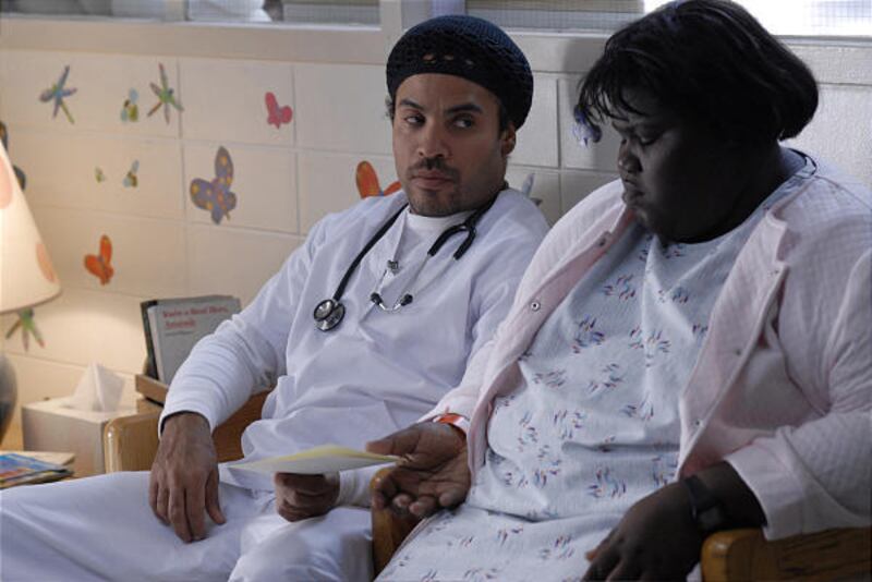 Lenny Kravitz and Gabourey Sidibe in a scene from "Precious." The film paints an unflinching picture of incest and abuse.