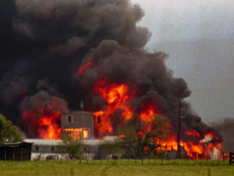 Fire engulfs the Branch Davidian compound near Waco, Texas, on April 19, 1993. The compound burned to the ground after FBI agents in an armored vehicle smashed the buildings and pumped in tear gas. The Justice Department said cult members set the fire.