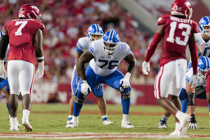 BYU offensive lineman Caleb Etienne in action during game against Arkansas earlier this season.