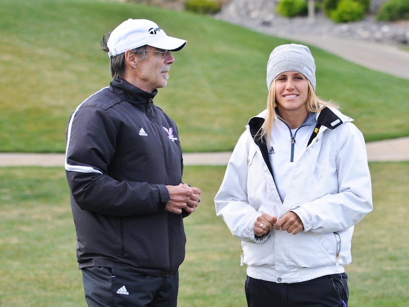 Chris Hendrickson (left) and Jenteal Jackson (right) talk at the Westminster Invitational last April. Jackson was promoted to head coach of the Westminster women's golf team on Friday.