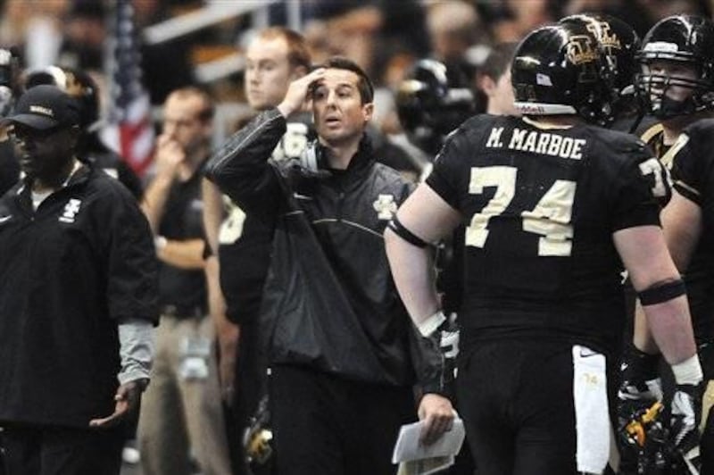 Idaho coach Jason Gesser reacts after a pass from quarterback Logan Bushnell is intercepted and returned for a touchdown by San Jose State during the fourth quarter of their NCAA college football game, Saturday, Nov. 3, 2012, in Moscow, Idaho. San Jose St