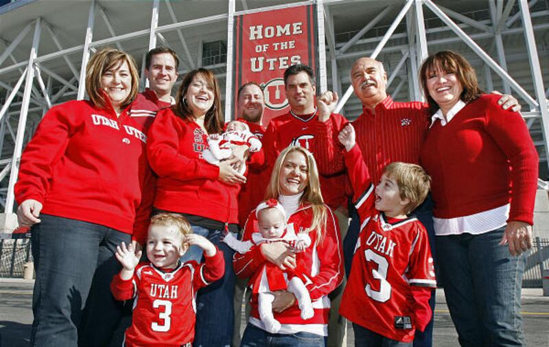 Family of avid Utah fans includes Mickelle Wyatt, left rear, Shay Wyatt, Genna Gitlin with baby Gabi Gitlin, Mike Gitlin, Brian Devir, Harold Marston and Emily Marston; left front Jacob Wyatt, Marisa Devir with baby Ella Devir and Drew Wyatt.
