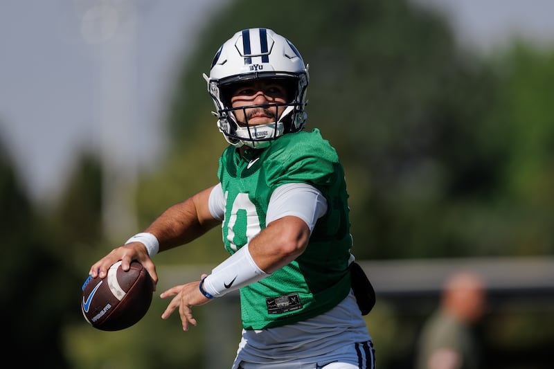 BYU QB Treyson Bourguet looks for a receiver during practice Aug. 5, 2025, in Provo.