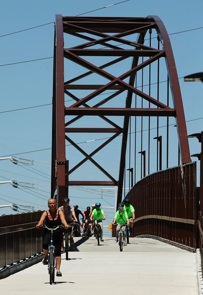 Cyclists ride along the Golden Spoke network of trails in Salt Lake City on Saturday, June 2, 2018. The Golden Spoke network runs from Ogden to Provo and is the longest multi-use trail network west of the Mississippi.