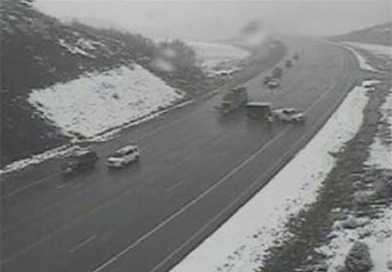 A Utah Highway Patrol trooper was struck by a vehicle while he was outside his car checking on other accident victims on state Route 91 around 5:30 p.m. Sunday.