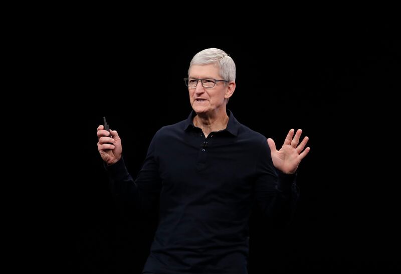 In this June 3, 2019, file photo, Apple CEO Tim Cook speaks at the Apple Worldwide Developers Conference in San Jose, Calif. In an interview released Monday, Cook appeared to say that Apple doesn’t want to only develop software for an electric and autonomous car, but create the whole vehicle — possibly including the hardware and hubcaps.