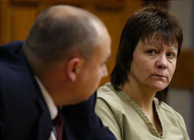 Kelley Lodmell, right, appears with public defender Rocky Wixom during her arraignment on June 25, 2003, in Idaho Falls on a murder charge.