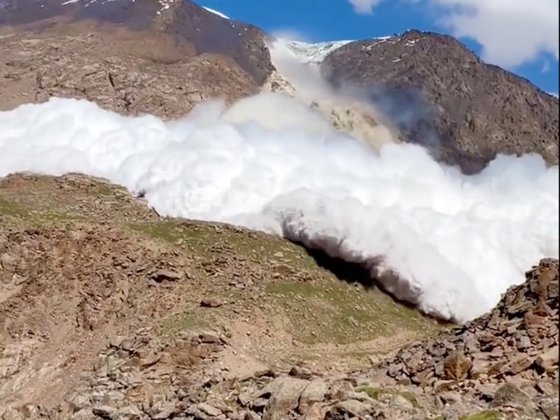 A screen shot from a YouTube clip of a glacier collapse in Kyrgyzstan.