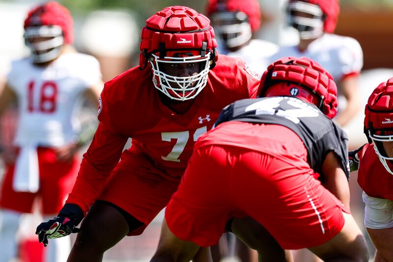 Utah players line up during fall camp at the University of Utah in Salt Lake City