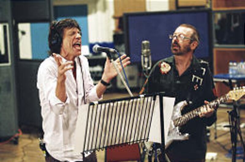 Mick Jagger, left, and Dave Stewart record the soundtrack for the upcoming "Alfie" movie remake.