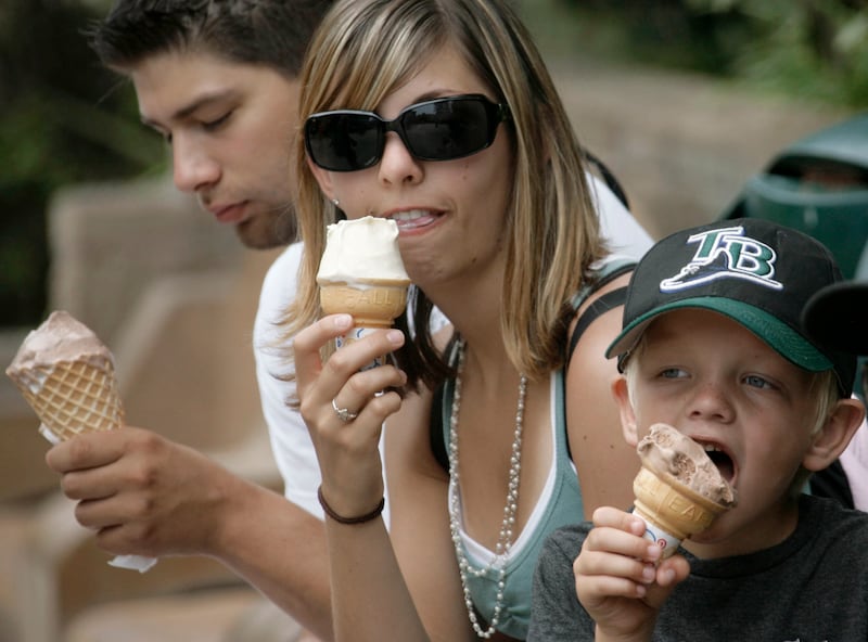 Visitors at the Los Angeles Zoo enjoy ice cream cones on Thursday, July 5, 2007.