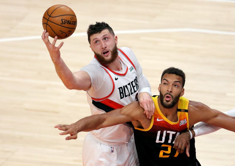 Portland Trail Blazers center Jusuf Nurkic battles for a rebound with Utah Jazz center Rudy Gobert in Salt Lake City.