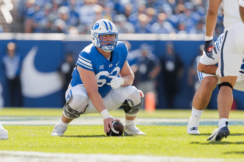 BYU center Bruce Mitchell prepares to snap the ball during the Cougars victory over Arizona Saturday, Oct. 12, 2024, at LaVell Edwards Stadium in Provo.