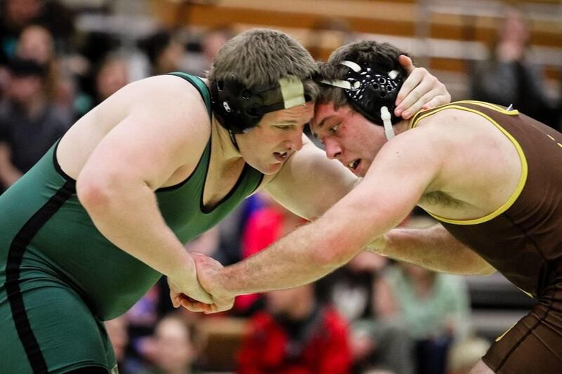 UVU sophomore Adam Fager (left) grapples with Arizona State's Levi Cooper at the PE Building in Orem on Jan. 18.