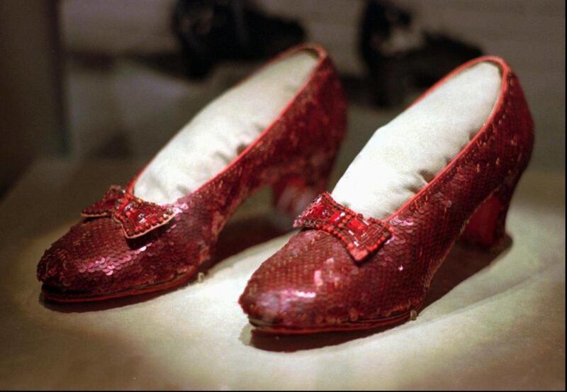 This April 10, 1996 file photo shows one of the four pairs of ruby slippers worn by Judy Garland in the 1939 film "The Wizard of Oz" on display during a media tour of the "America's Smithsonian" traveling exhibition in Kansas City, Mo. An anonymous donor