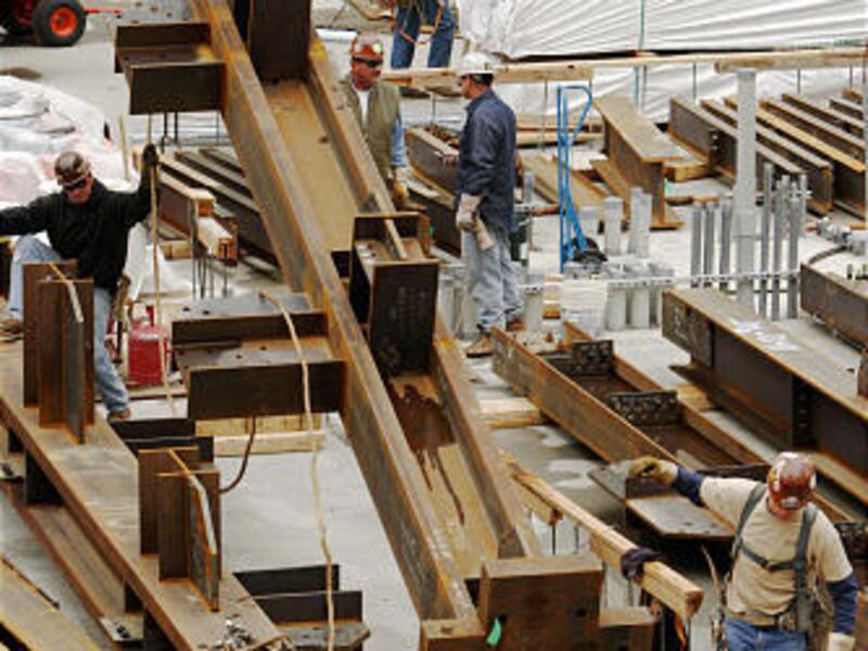Okland Construction workers begin placing steel sections for the 22-story 222 South Main Street tower, which will change the skyline of downtown Salt Lake.