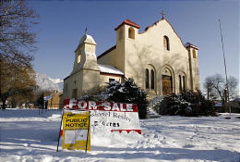 The old St. Francis of Assisi church in Provo hasn't sold. The Provo Landmarks Commission refused this week to delist it for fear it might be bulldozed.
