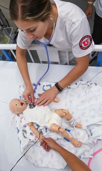 Nursing student Patricia Dawood works with a cutting-edge baby simulator named Hal at the University of Utah's College of Nursing in Salt Lake City on Monday, July 30, 2018.