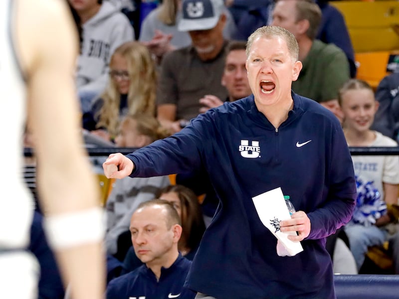 Utah State's Jerrod Calhoun coaches during the Aggies' 87-47 rout of Air Force on March 8, at the Spectrum in Logan.
