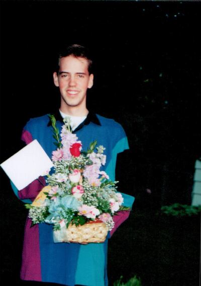 This October 1999 photo shows 23-year-old Josh Powell presenting flowers to a romantic interest. Powell pursued relationships with several young Latter-day Saint women in the Seattle area following his breakup with Catherine Terry and prior to his marriag