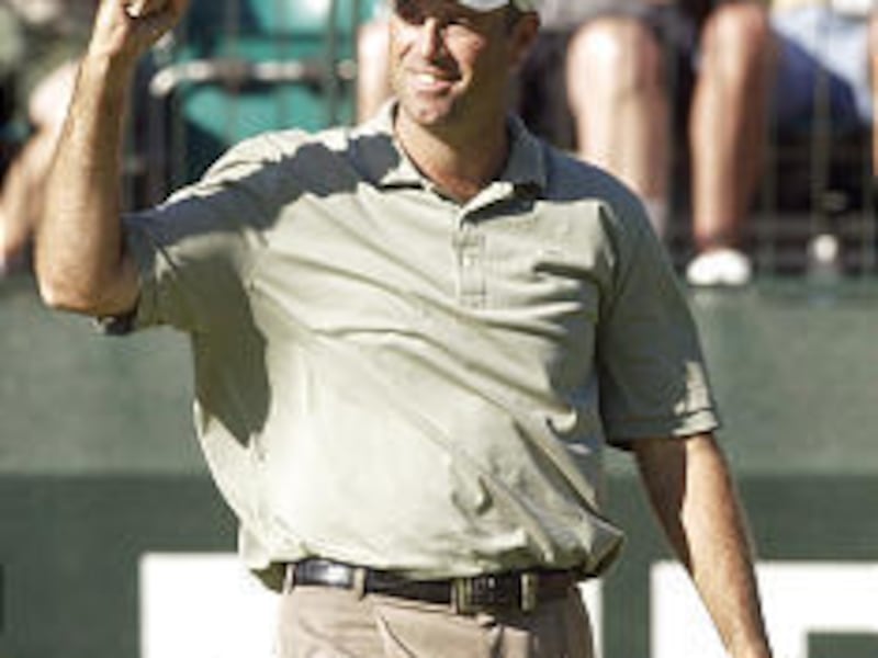 Stewart Cink pumps his fist after getting a birdie during the third round of the NEC Invitational.