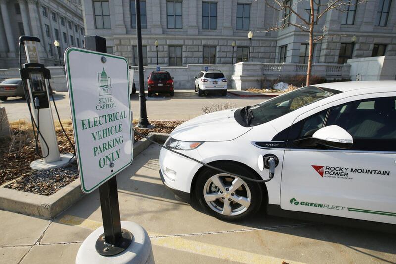 FILE - An Rocky Mountain Power electric car is charged at the Utah State Capitol in Salt Lake City on Wednesday, Jan. 18, 2017. A regional electric vehicle network spanning 5,000 miles in seven states across the West, including Utah, was announced Wednesd