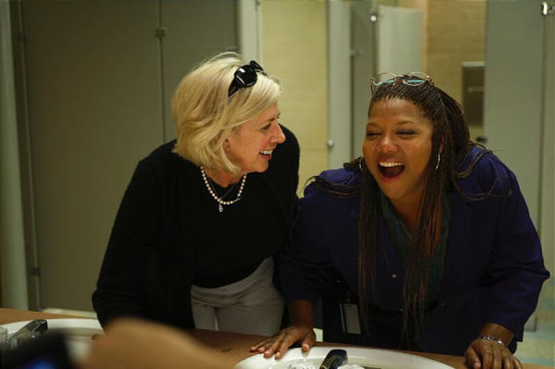 Director Callie Khouri sets up a scene with Queen Latifah in the independently funded "Mad Money."